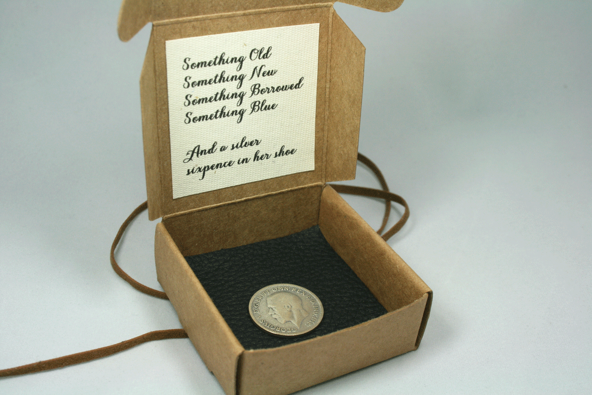 Half zilveren sixpence uit 1933